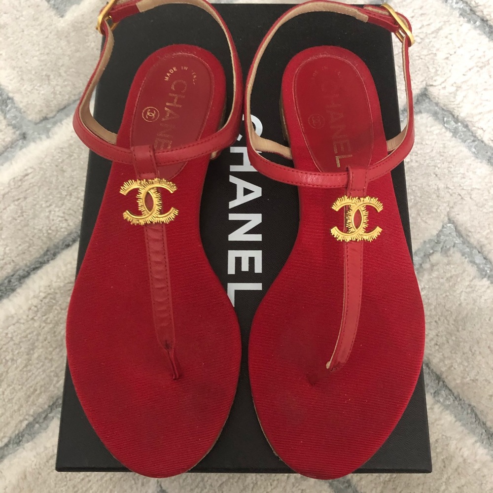 Authentic CHANEL red and aged gold thongs.